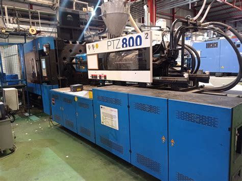 yizumi injection moulding machine price